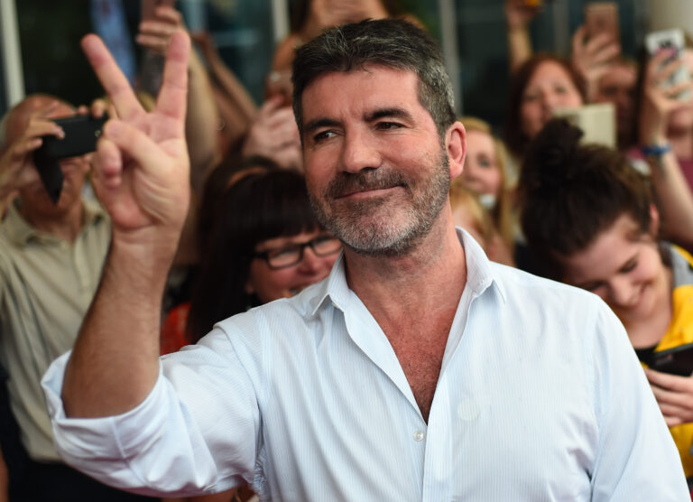 Simon Cowell trades life of fame for new role as stay-at-home dad – wife now runs his company